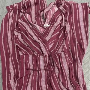 Maroon jumpsuit. Wide leg. Very flowy